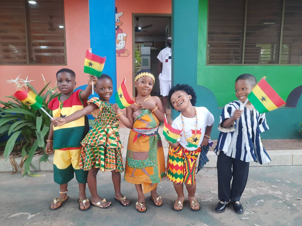 Proud smiles in colourful traditional wear